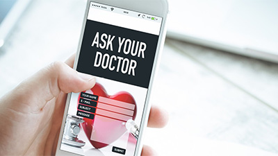 a closeup of a phone that says 'ask your doctor'